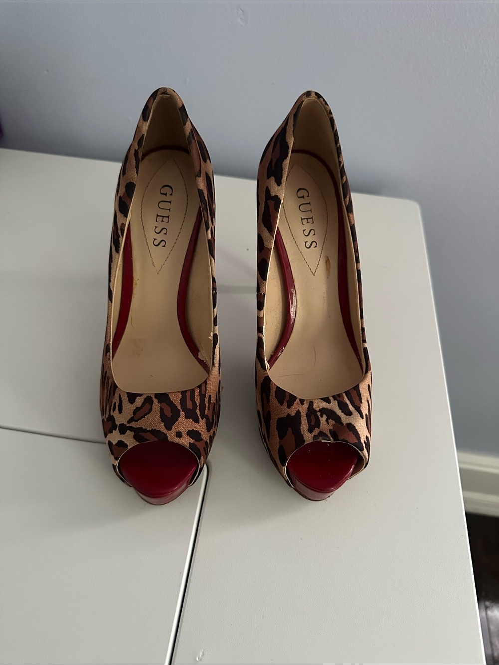 GUESS Leopard Print Peep Toe Pumps with Red Accents